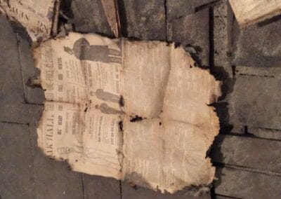 Newspaper found under stage